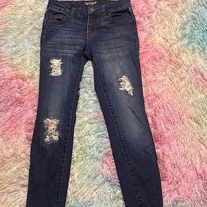 stylish distressed jeans by Cat & Jack! Made with high-quality materials.